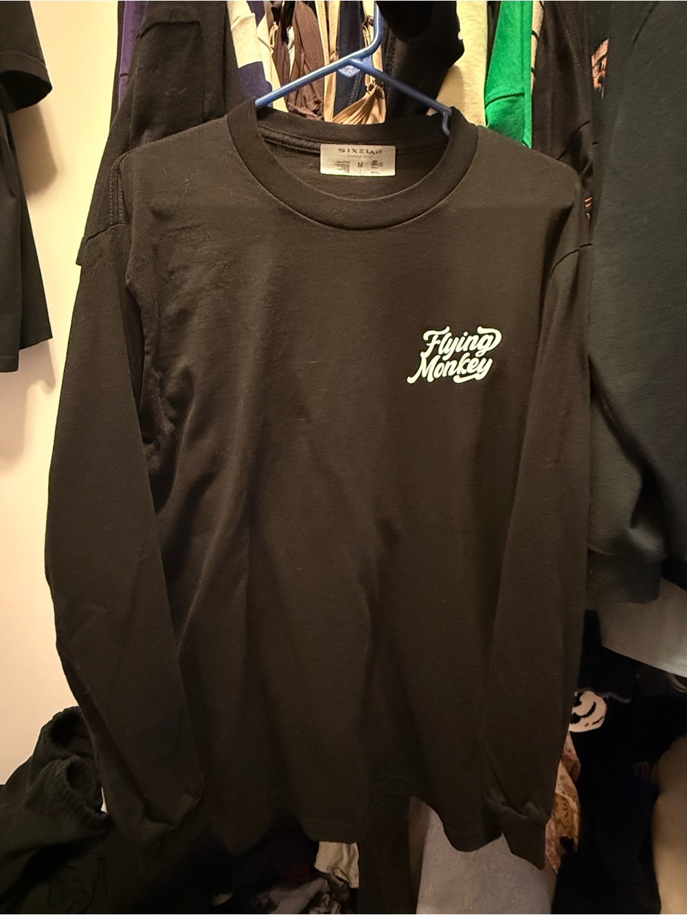 Flying Monkey Black Long Sleeve Crewneck with White Script Logo